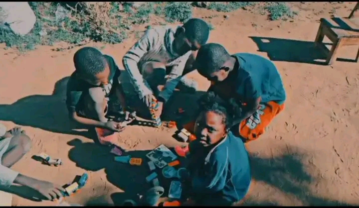 Four young Children playing