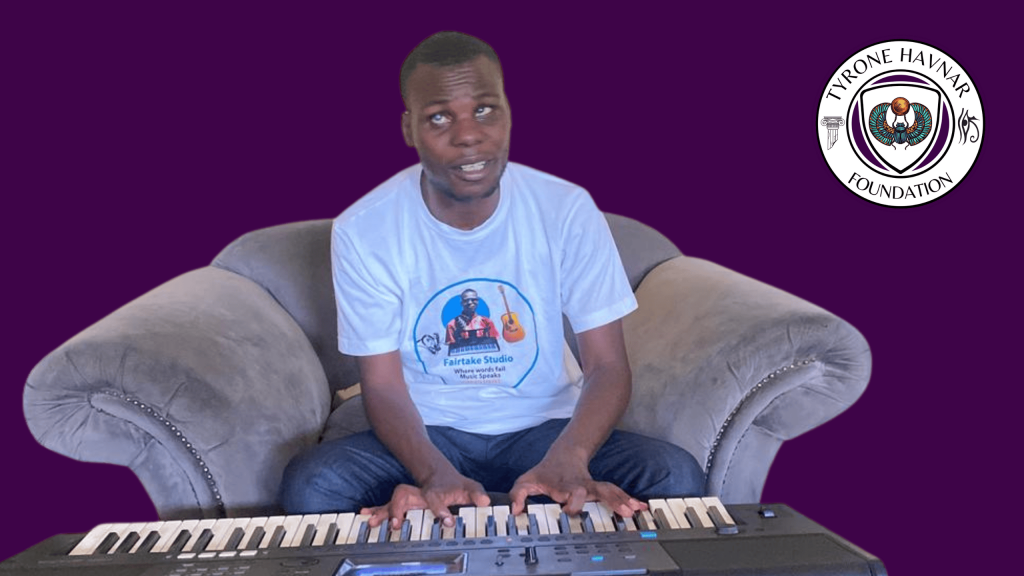 Image of Lazarus Hakalebula, playing a keyboard