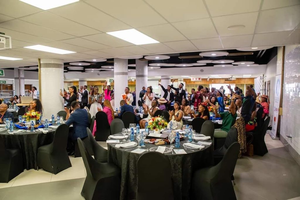 mixed cohort of youth celebrating their leadership cohort in South Africa